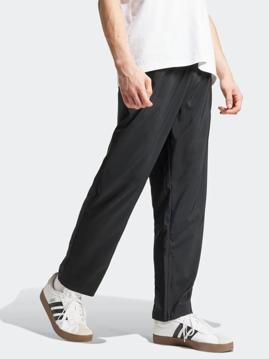 Joggingbroeken*adidas Small Essentials Logo Stanford Trainingspakbroek met open zoom