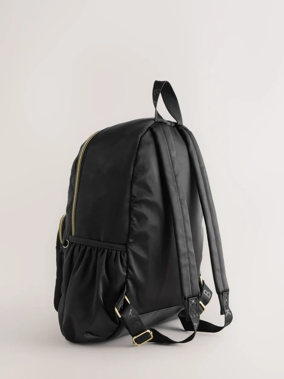 Tassen*Baker by Ted Baker gewatteerde zwarte rugzak met strik en etui voor meisjes, voor de Back to School collectie