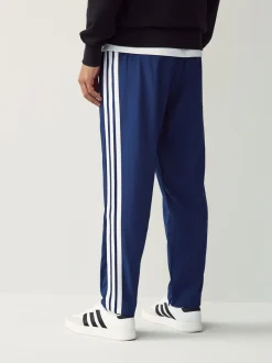 Joggingbroeken|adidas - Essentials 3-Strepen Stanford joggingbroek met open zoom Blauw