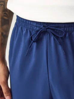 Joggingbroeken|adidas - Essentials 3-Strepen Stanford joggingbroek met open zoom Blauw