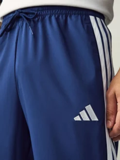 Joggingbroeken|adidas - Essentials 3-Strepen Stanford joggingbroek met open zoom Blauw