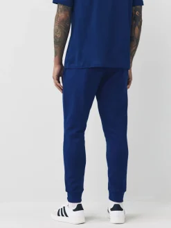 Joggingbroeken*adidas - Essentials Feelcozy fleece joggingbroek Blauw
