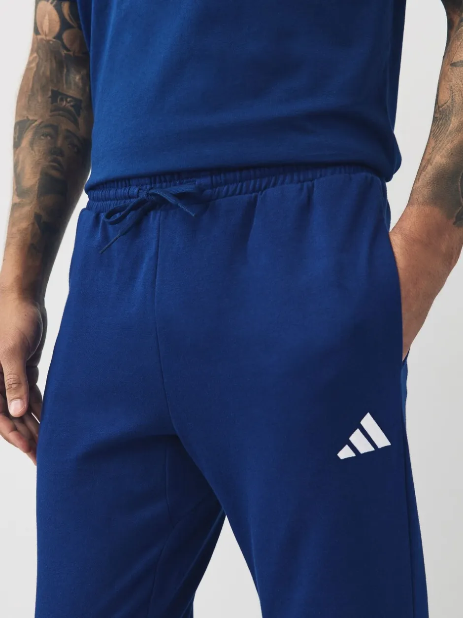 Joggingbroeken*adidas - Essentials Feelcozy fleece joggingbroek Blauw