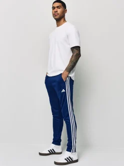 Joggingbroeken|adidas - Train Essentials trainingsjoggingbroek met 3 strepen Blauw