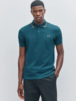 Poloshirts*Fred Perry Blauw - polo met tweekleurig gestreept randje