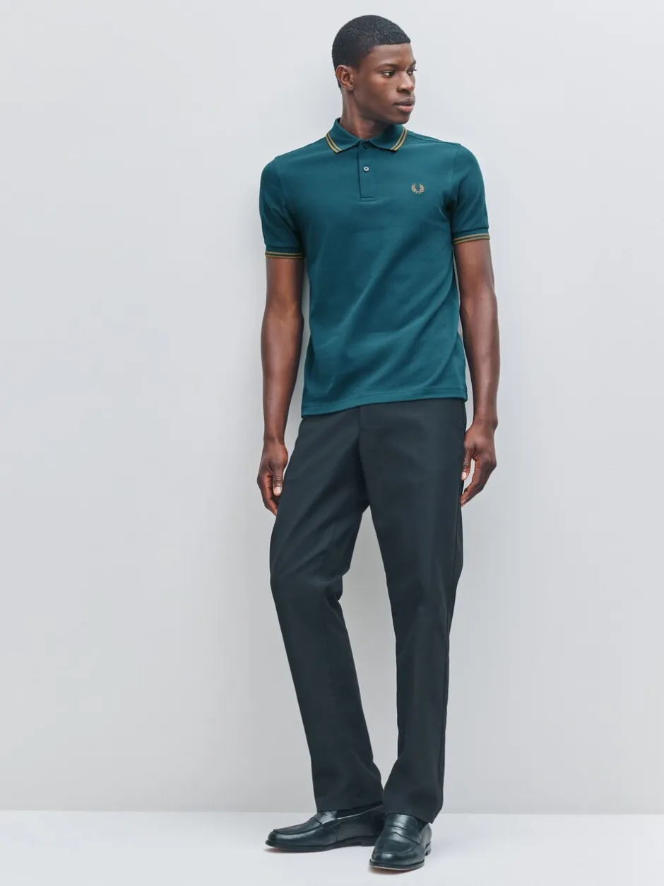 Poloshirts*Fred Perry Blauw - polo met tweekleurig gestreept randje
