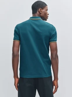 Poloshirts*Fred Perry Blauw - polo met tweekleurig gestreept randje