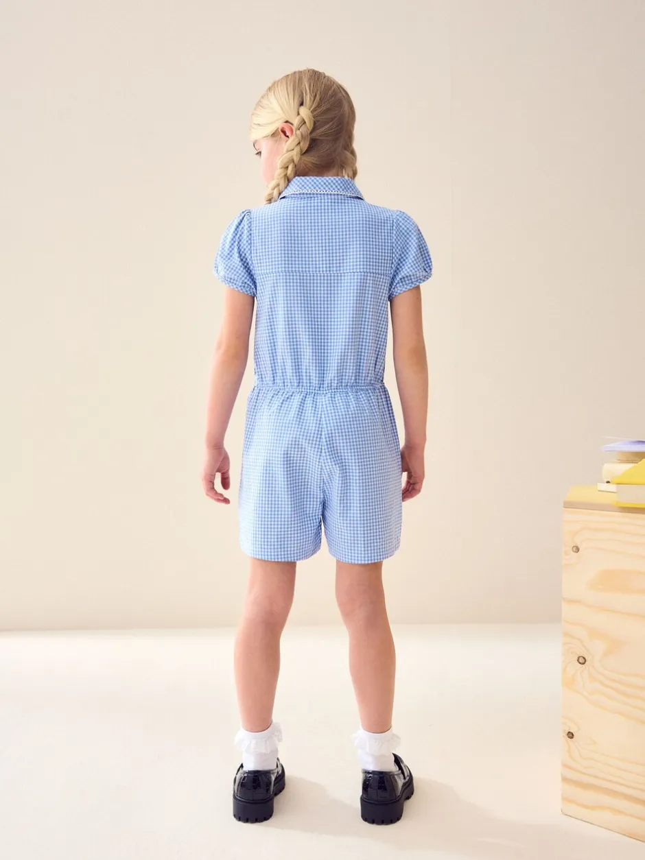 Jumpsuits En Playsuits*Next - Geruit schoolspeelpakje met rits aan de voorzijde en hoog aandeel katoen (3 - 14 jr) Blauw