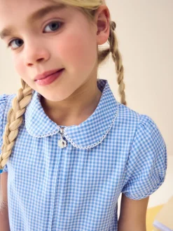 Jumpsuits En Playsuits*Next - Geruit schoolspeelpakje met rits aan de voorzijde en hoog aandeel katoen (3 - 14 jr) Blauw
