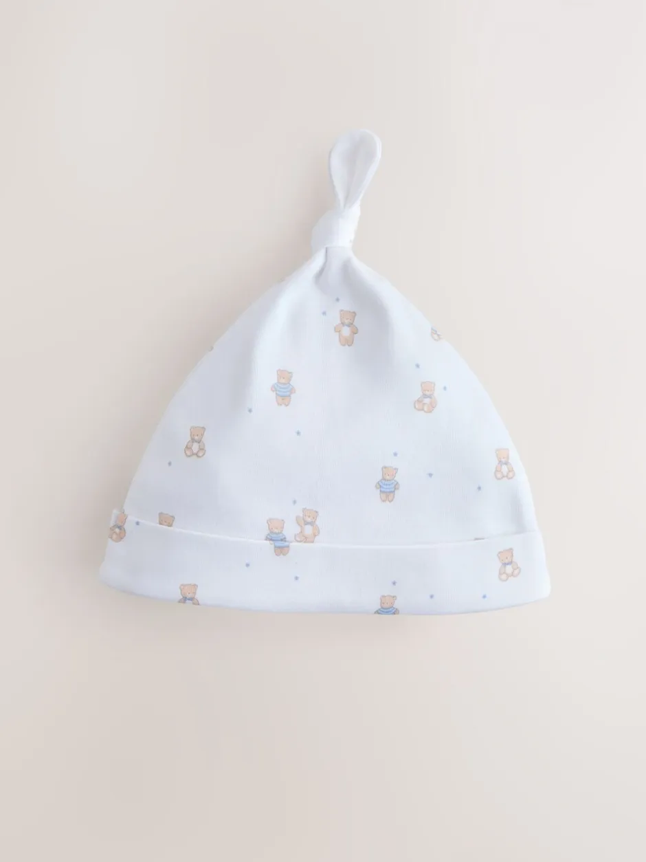 Mutsjes En Antikrabwantjes|Mutsen, Handschoenen En Sjaals|Next Blauw - Set van 3 babymutsen met gestrikte bovenkant (0-12mnd)