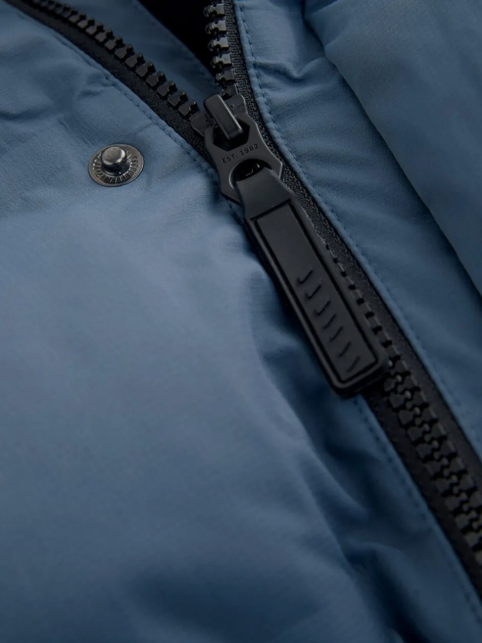 Schoolkleding|Jassen En Jacks|Next - Waterdichte lange pufferjas met fleecevoering (3-17jr) Blauw