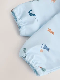 Slabbetjes*Next Blauw Dino Jungle - Slabbetje met mouwen voor spenen en voeden