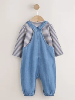 Sets En Combisets|Rompertjes En Tuinbroeken*Next - Babyset van denim bretelbroeken en bodysuit (0 mnd - 2 jr) Blauw met dinosaurus