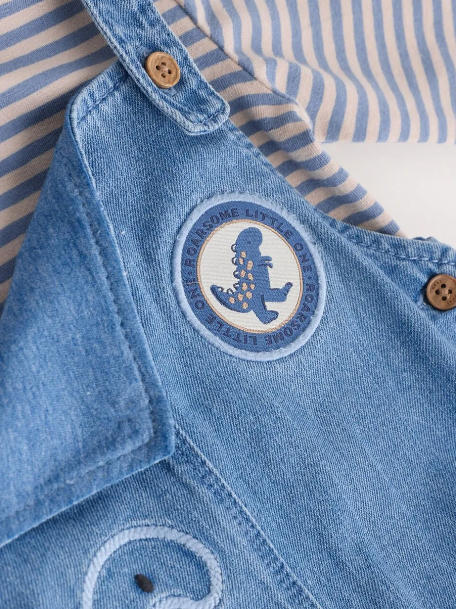 Sets En Combisets|Rompertjes En Tuinbroeken*Next - Babyset van denim bretelbroeken en bodysuit (0 mnd - 2 jr) Blauw met dinosaurus