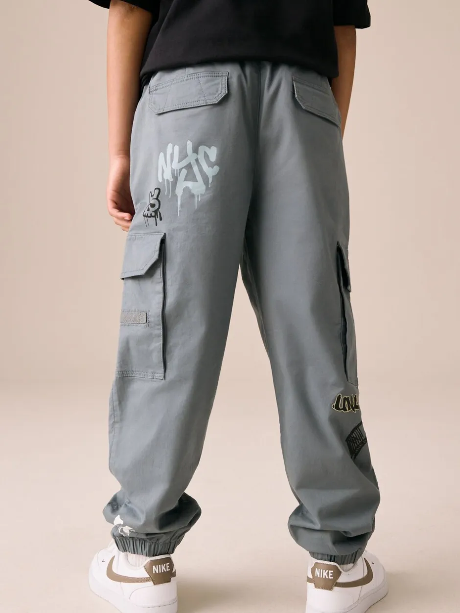 Broeken En Chino's|Next Blauw met graffitiprint - Cargobroek (3-16 jr)