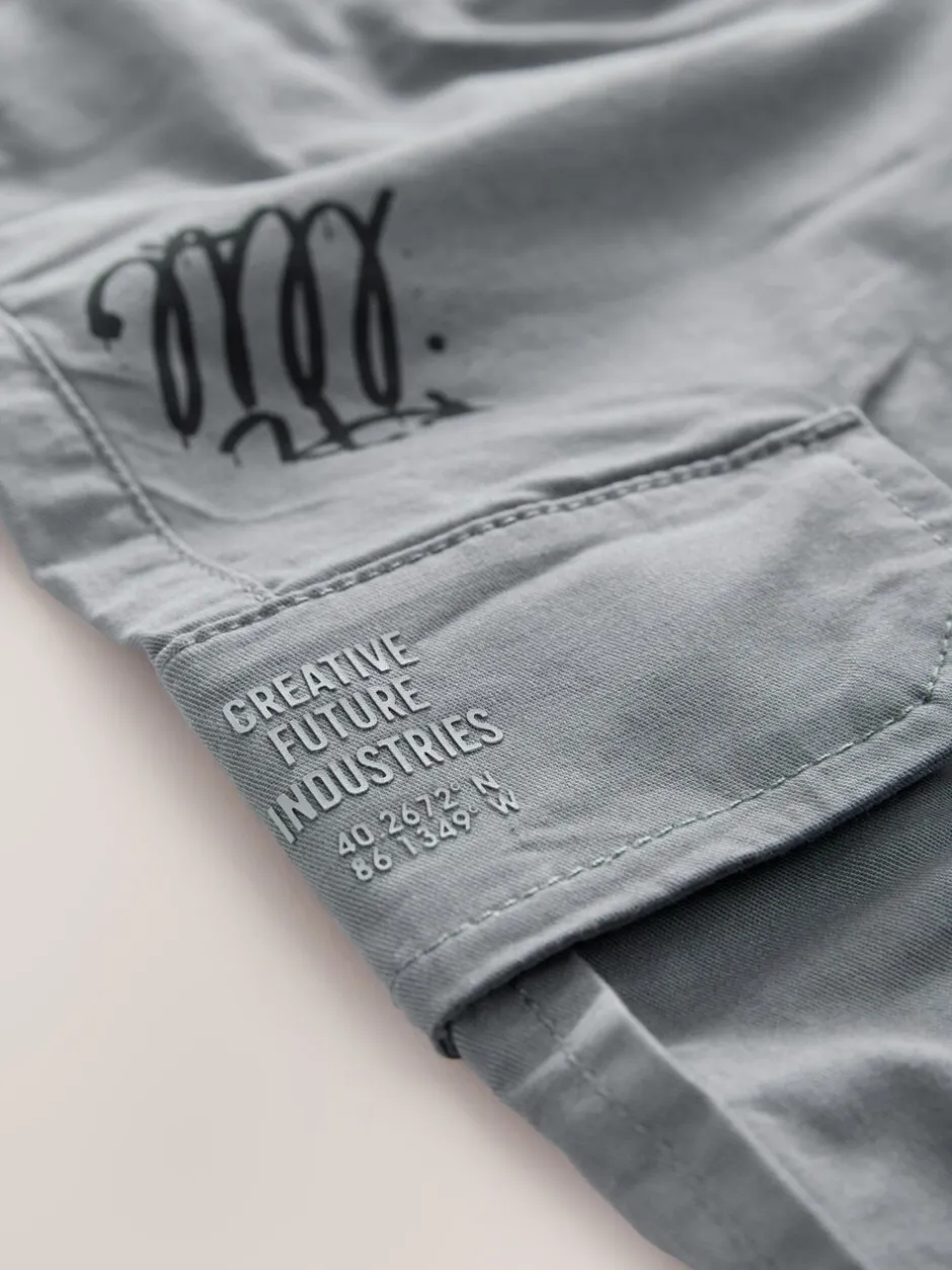 Broeken En Chino's|Next Blauw met graffitiprint - Cargobroek (3-16 jr)