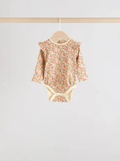 Rompertjes En Hemdjes*Next - Verpakking van 4 babyrompers met lange mouwen en ruches (0mnd-2jr) Blauw/crème/koraal Ditsy