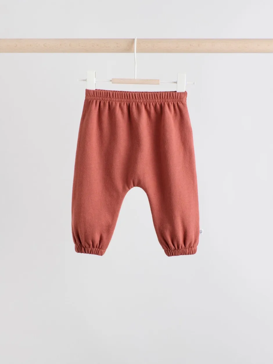 Truien En Breisels|Sets En Combisets|Next - Set van fleece top en joggingbroek voor baby's (0mnd -2jr) Blauwe gezichten met dambordmotief