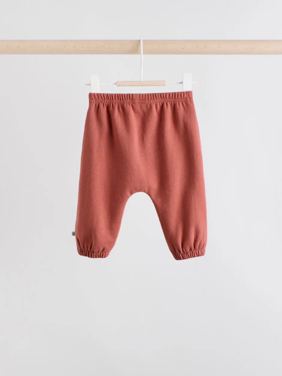 Truien En Breisels|Sets En Combisets|Next - Set van fleece top en joggingbroek voor baby's (0mnd -2jr) Blauwe gezichten met dambordmotief