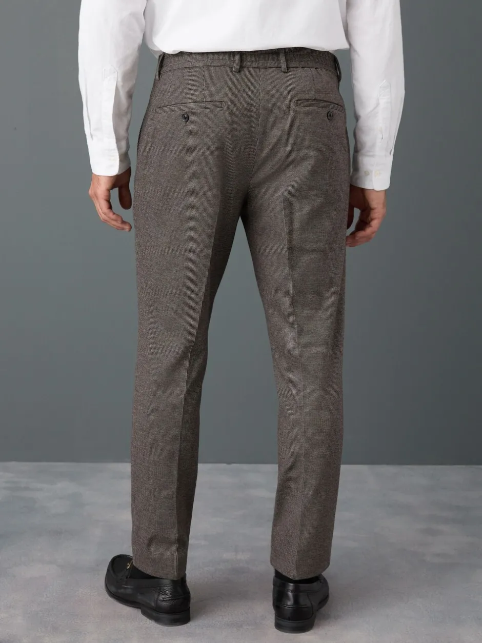 Formele Broek|Broeken En Chino's*Next - Slim fit getextureerde broek met elastische achterkant en stretchy Bruin