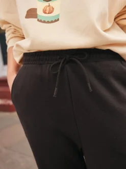 Leggings En Joggingbroeken|Next - Essentiële jersey joggingbroek met manchetten Chocoladebruin