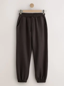 Leggings En Joggingbroeken|Next - Essentiële jersey joggingbroek met manchetten Chocoladebruin