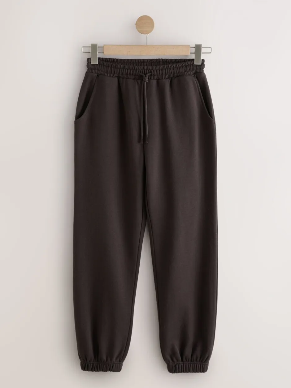 Leggings En Joggingbroeken|Next - Essentiële jersey joggingbroek met manchetten Chocoladebruin