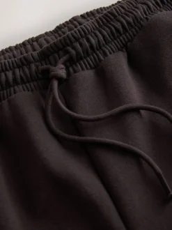 Leggings En Joggingbroeken|Next - Essentiële jersey joggingbroek met manchetten Chocoladebruin