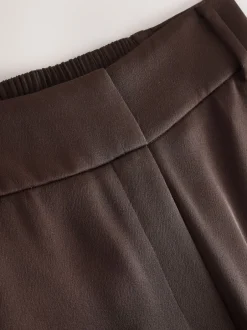 Broeken*Next Chocoladebruin - Satijnen broek met wijde pijpen en elastiek in de achterkant