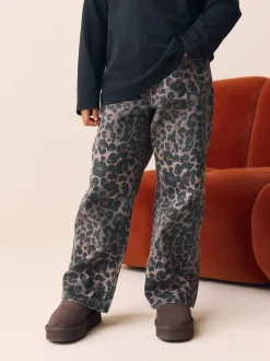 Jeans|Next - Jeans met wijde pijpen (3-16 jr) Chocoladebruin luipaardmotief