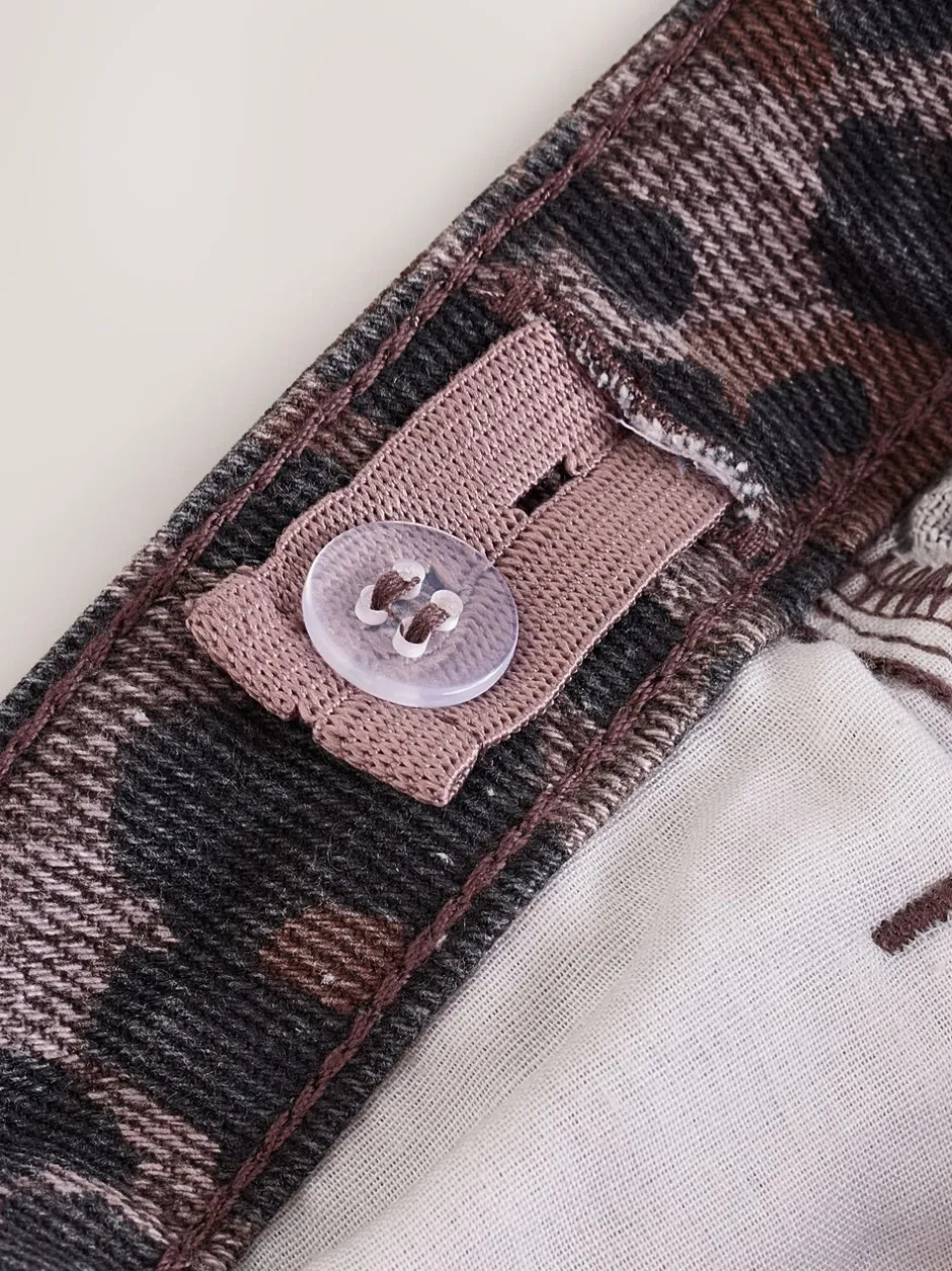 Jeans|Next - Jeans met wijde pijpen (3-16 jr) Chocoladebruin luipaardmotief