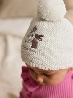 Mutsjes En Antikrabwantjes|Mutsen, Handschoenen En Sjaals|Next Crème - Baby geborduurde konijnenfiguur hoed (0mnd -2jr)