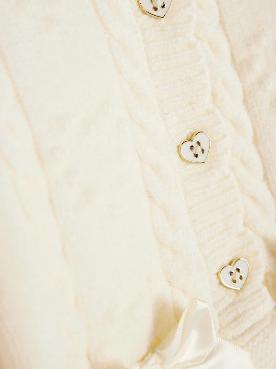 Gebreide Kleding|River Island - vest met peplum voor babymeisjes Crème