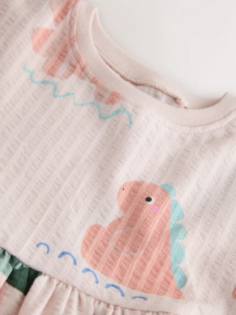 Jurken|Jurken|Next - Jersey jurk met lange mouwen (3 mnd-7 jr) Crème met dinosaurussen