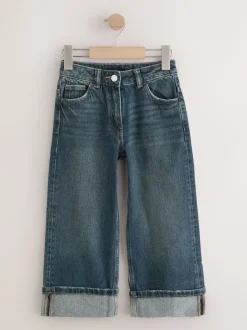 Jeans*Next Donkerblauw - Jeans met omgeslagen wijde pijpen (3-16jr)