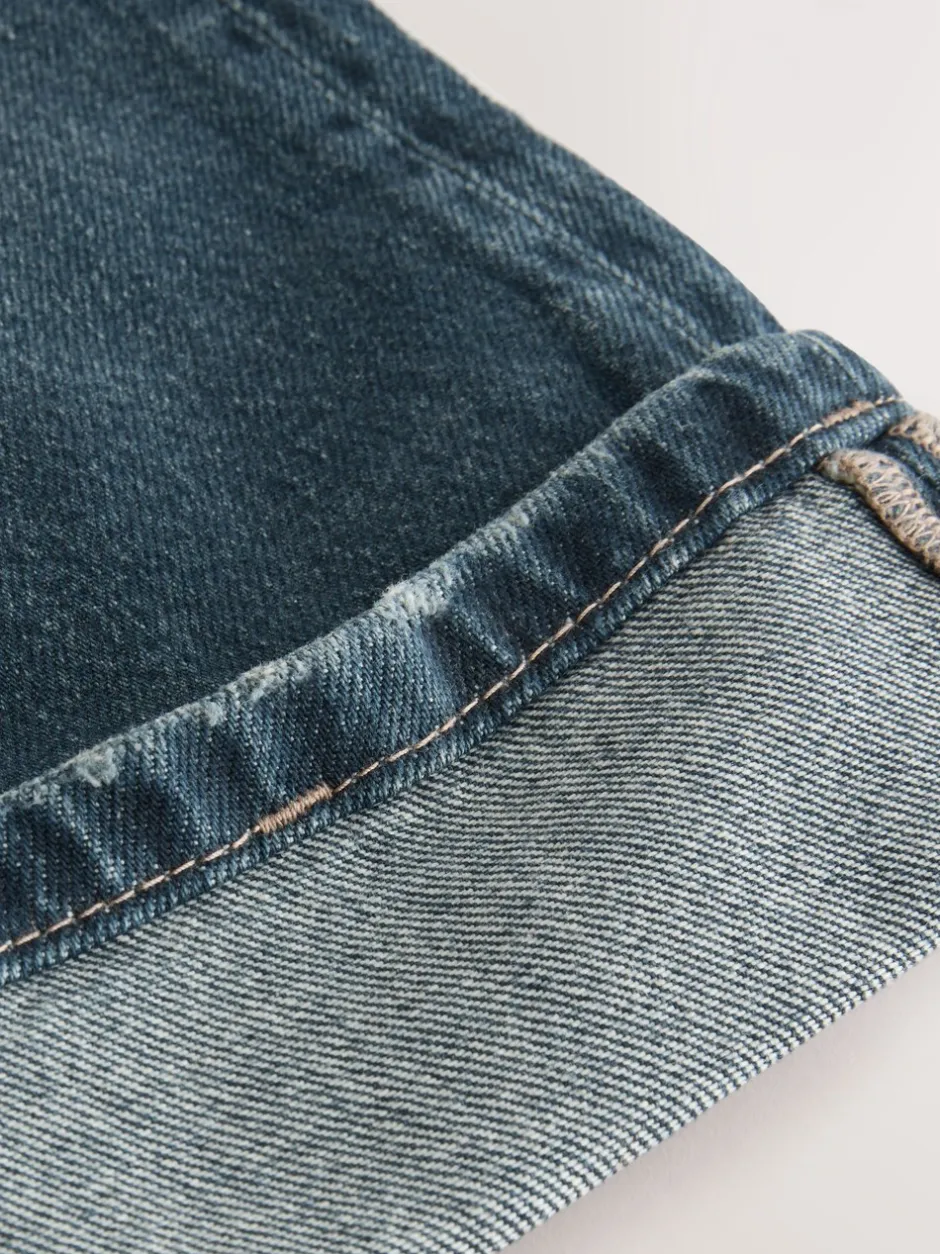Jeans*Next Donkerblauw - Jeans met omgeslagen wijde pijpen (3-16jr)