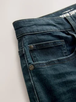 Jeans|Next Donkerblauwe wassing - Klassieke stretchjeans met standaard taps toelopende pasvorm