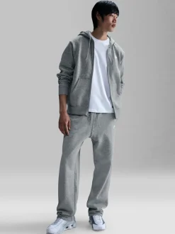 Joggingbroeken*Nike - Club Fleece joggingbroek met wijde pijpen Donkergrijs gemêleerd