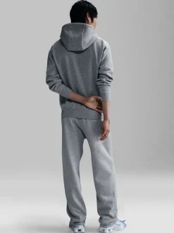 Joggingbroeken*Nike - Club Fleece joggingbroek met wijde pijpen Donkergrijs gemêleerd