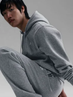 Joggingbroeken*Nike - Club Fleece joggingbroek met wijde pijpen Donkergrijs gemêleerd