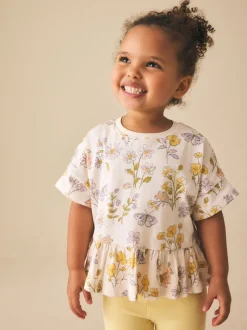 Tops|T-Shirts*Next Ecru met bloemenprint - T-shirt met peplum en korte mouwen (3mnd -7jr)