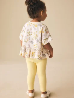 Tops|T-Shirts*Next Ecru met bloemenprint - T-shirt met peplum en korte mouwen (3mnd -7jr)