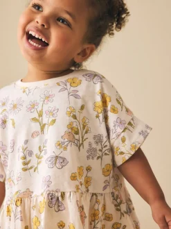 Tops|T-Shirts*Next Ecru met bloemenprint - T-shirt met peplum en korte mouwen (3mnd -7jr)