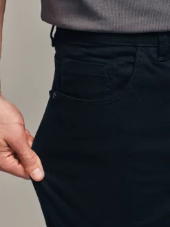 Jeans|Next Effen zwart - Klassieke stretchjeans met standaard taps toelopende pasvorm