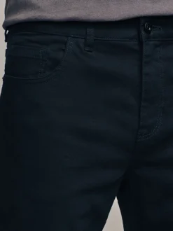 Jeans|Next Effen zwart - Klassieke stretchjeans met standaard taps toelopende pasvorm