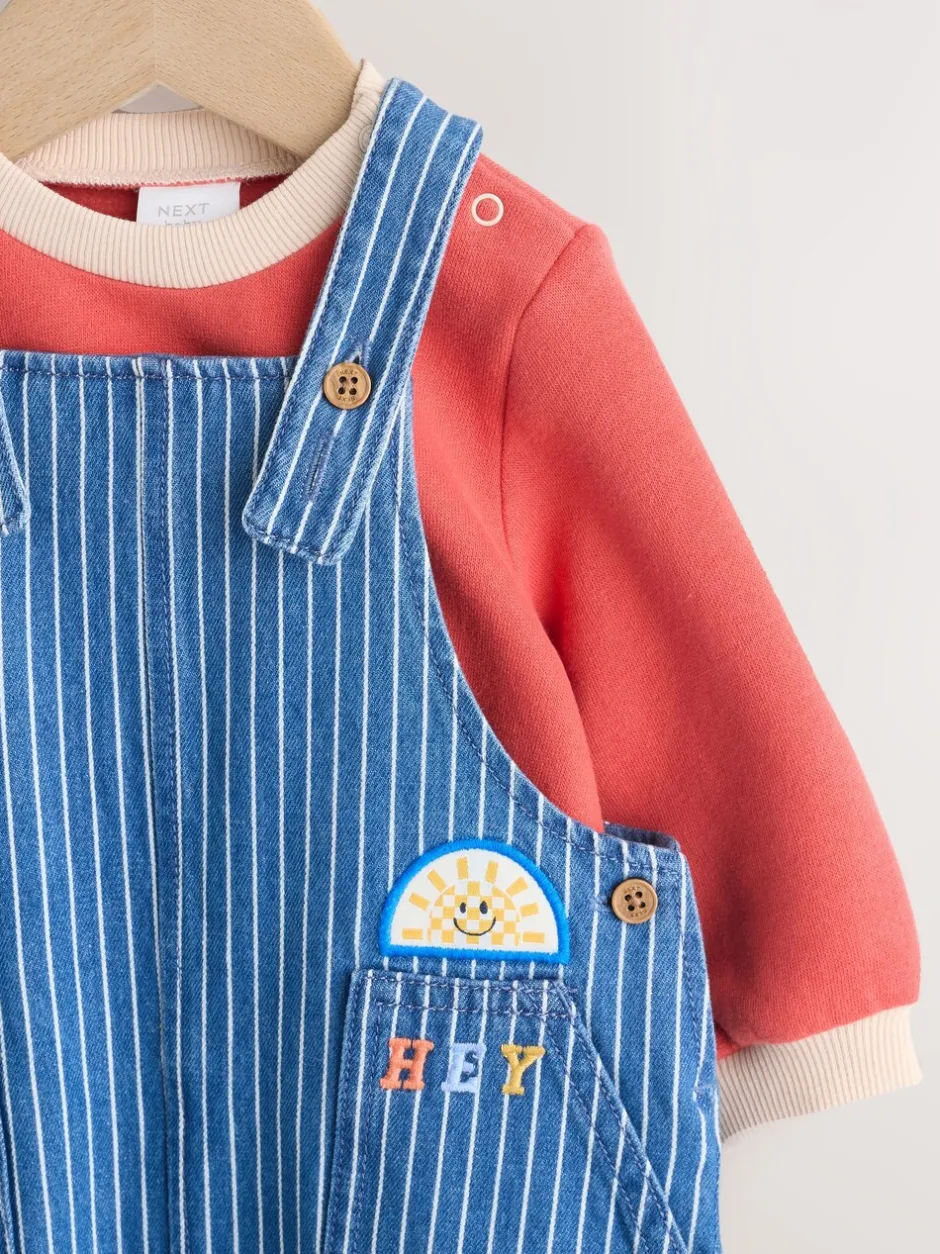 Rompertjes En Tuinbroeken*Next - Babyset van denim bretelbroeken en bodysuit (0 mnd - 2 jr) Felgekleurde streep met figuurtjes