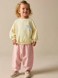 Sets En Combisets|Truien En Breisels*Next Geel met dierenprint - Set van sweatshirt en joggingbroek met rechte wijde pijpen (3mnd -7jr)