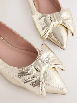 Lage Schoenen|Next - Ballerina's met spitse neus en strik Goud