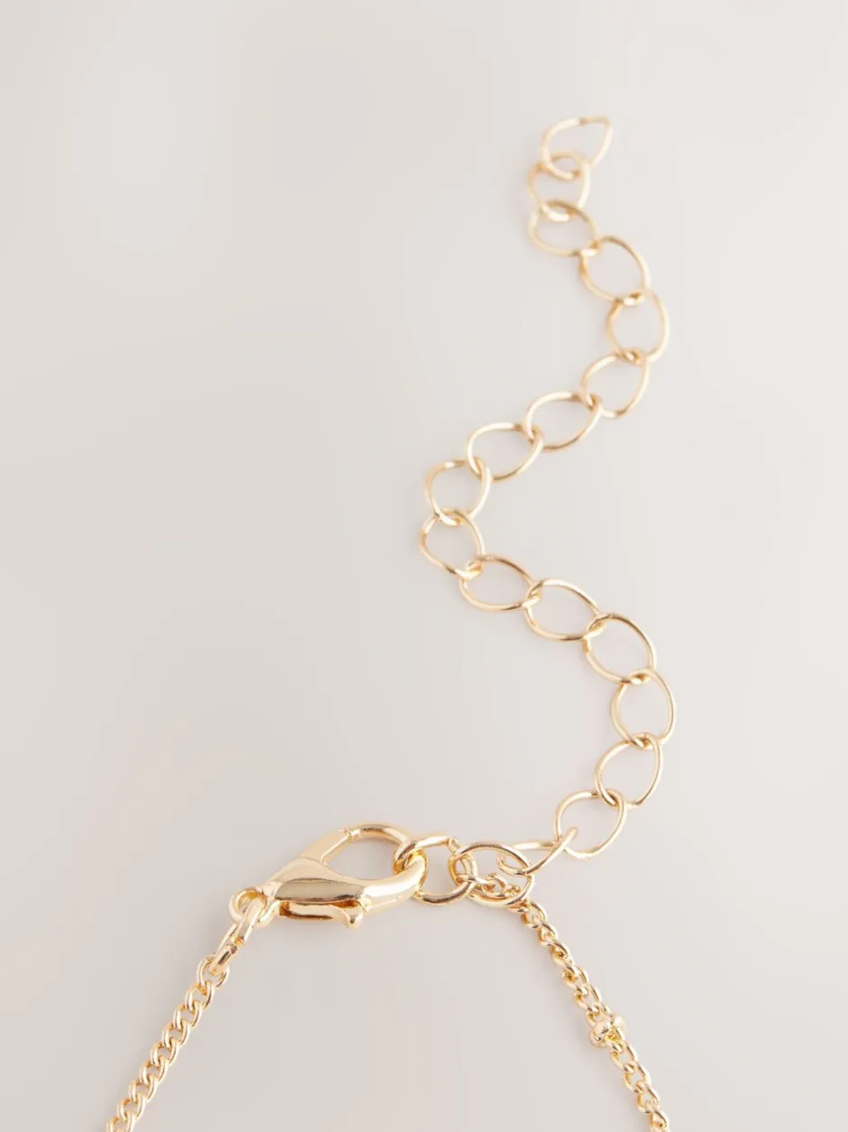 Sieraden|Next Goudkleurig - Ketting met bloemenhanger