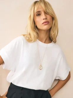 Sieraden|Next - Ketting met hangertje van vereende ringen Goudkleurig